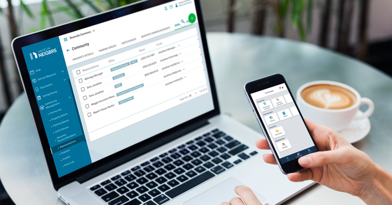 person using condo management software on cell phone and computer