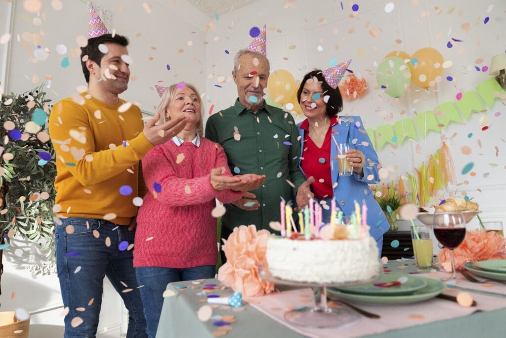 People celebrating a birthday party at an HOA Clubhouse. 