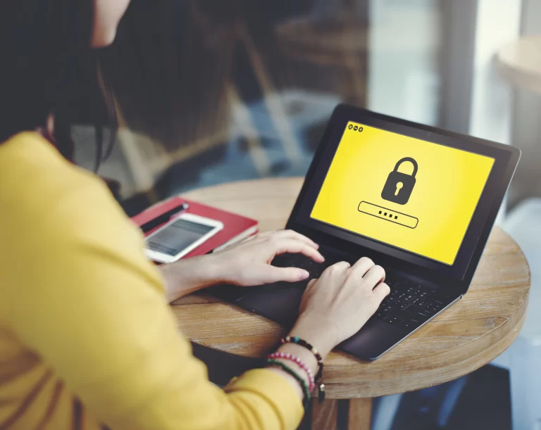 women watching a computer screen and learning about hoa security responsibilities