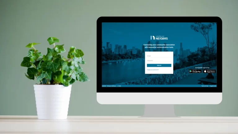 pot plant next to a computer with neigbrs by vinteum hoa portal login page